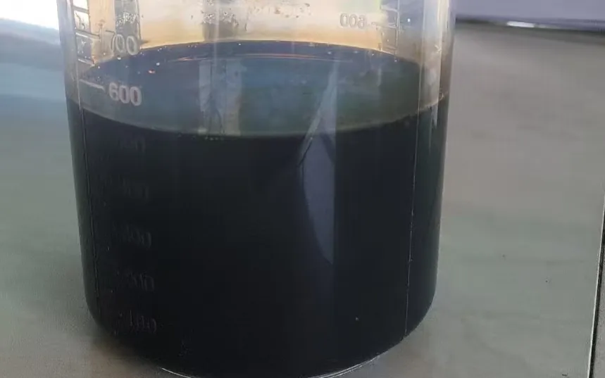 Naphthalene superplasticizer (SNF) liquid sample in a graduated cylinder